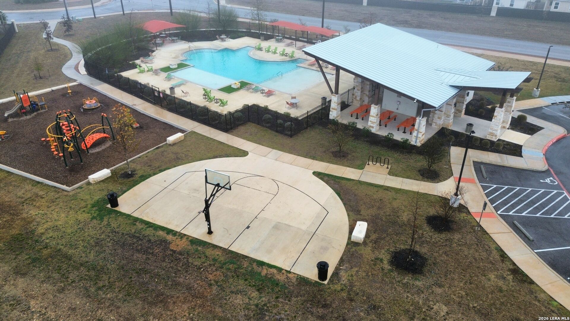 5496 Rue Girard Converse, TX 78109 - Photo 40 of 40 an aerial view of a house with a swimming pool