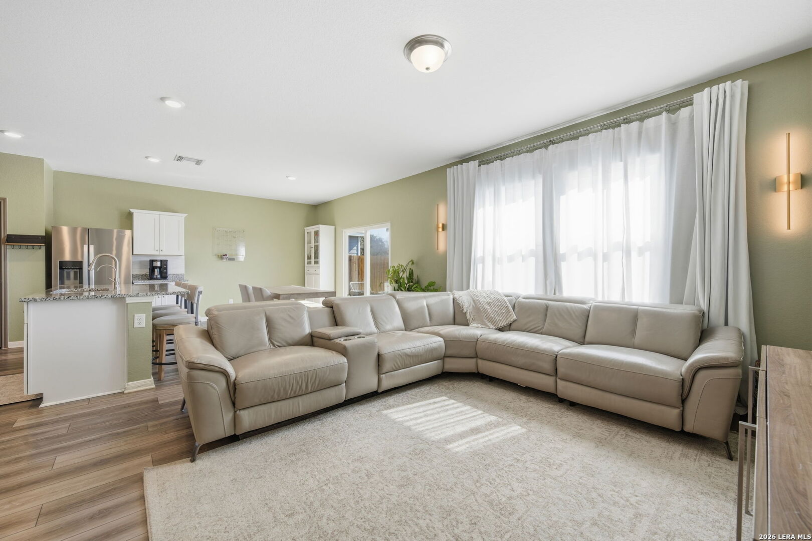 5496 Rue Girard Converse, TX 78109 - Photo 9 of 40 a living room with furniture and a large window