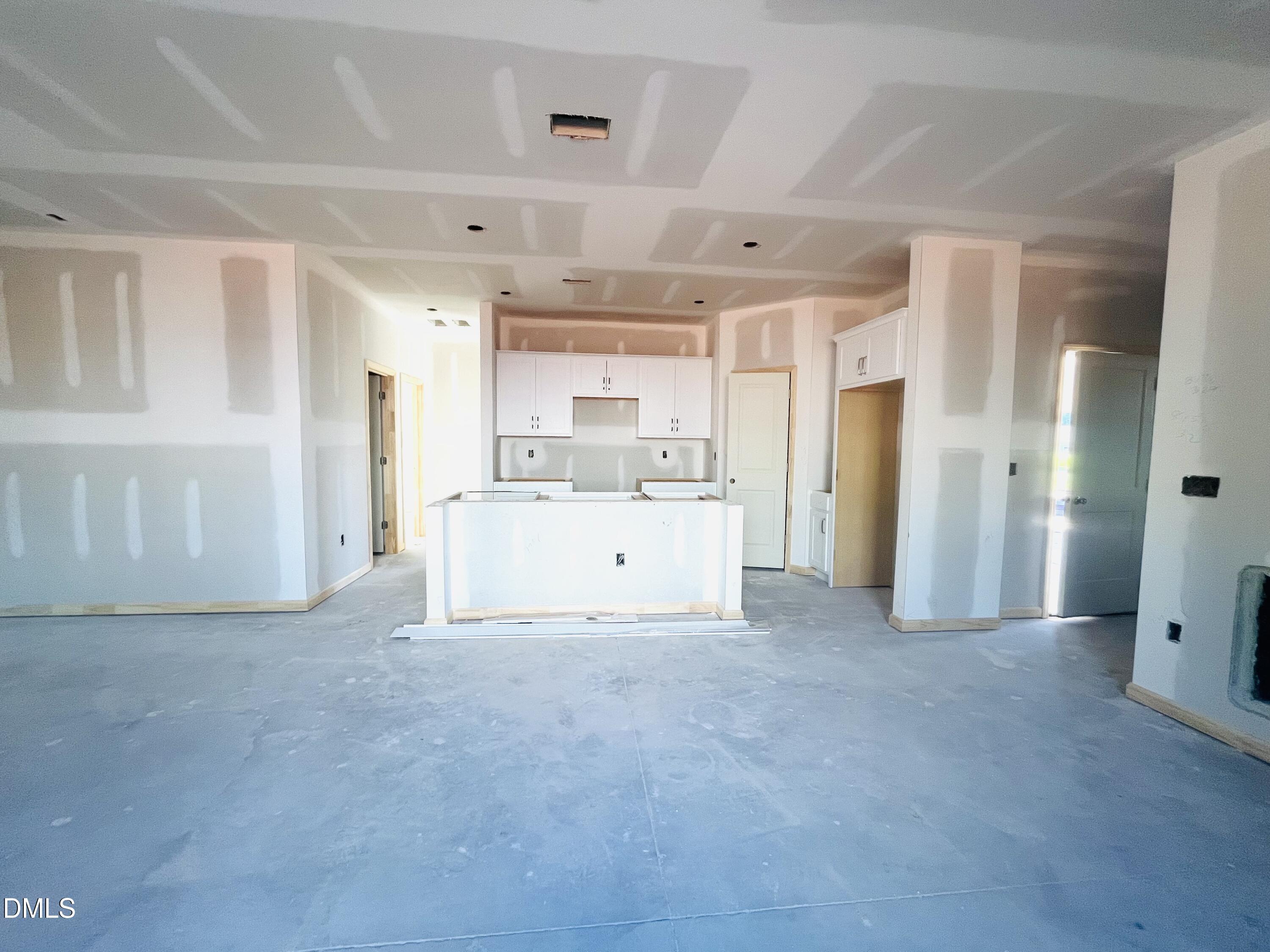 11695 Salers Loop Middlesex, NC 27557 - Photo 16 of 29 a view of a kitchen with a sink and a refrigerator