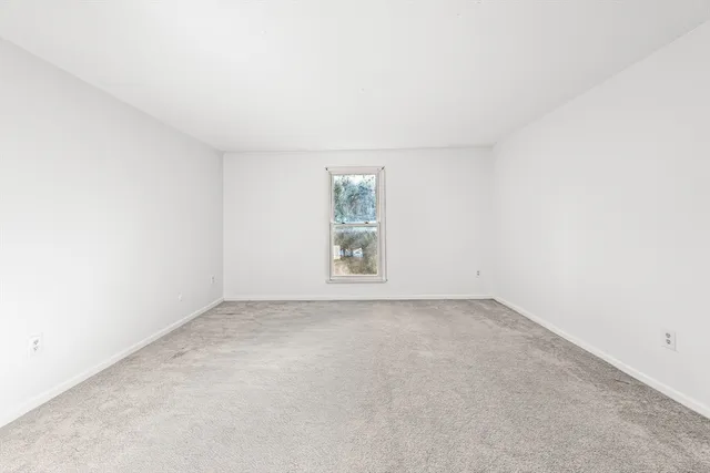 an empty room with window