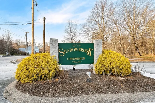 a sign board with a yard