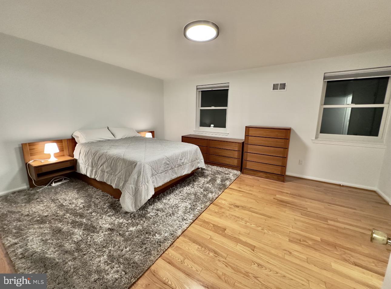 4203 Main Street Alexandria, VA 22309 - Photo 4 of 6 a bedroom with a bed and a television