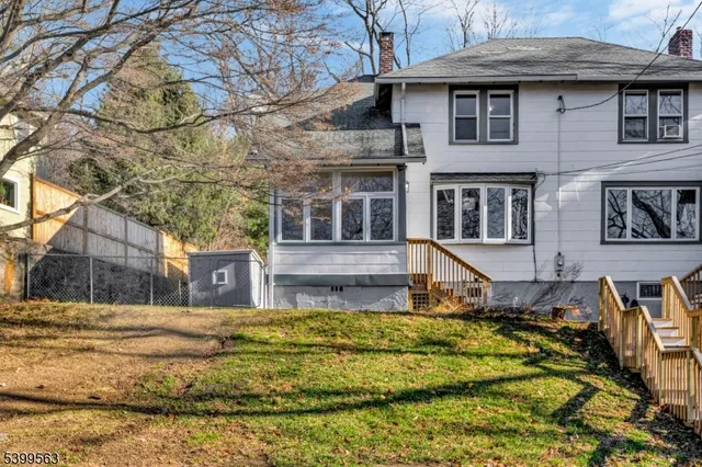 a view of a house with a swimming pool