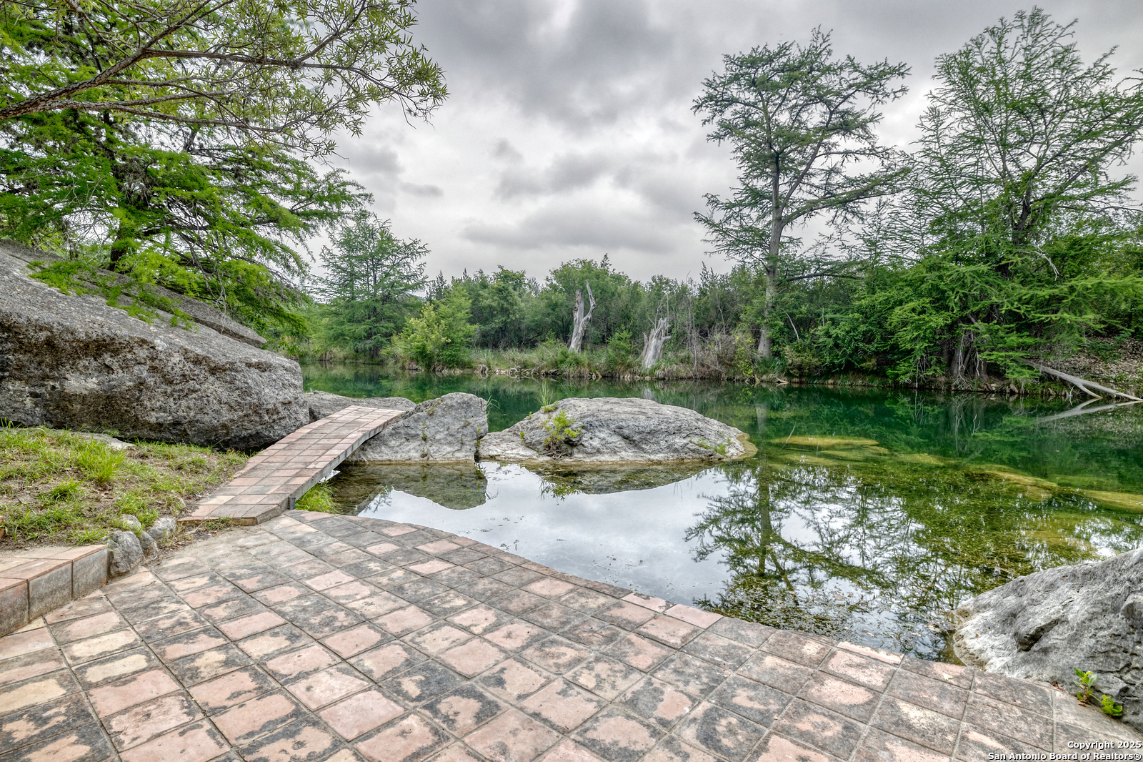 22 Camino Del Rancho Concan, TX 78838 - Photo 8 of 16 a view of a lake with outdoor space