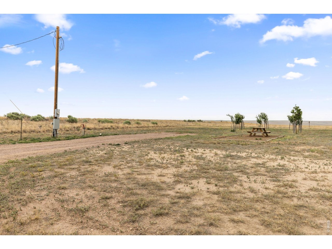 13550 Deter-Winters Road Byers, CO 80103 - Photo 25 of 50 This is a view of the main RV pad from the north side of the barn