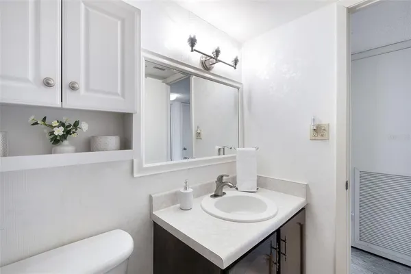 a bathroom with a sink and a toilet