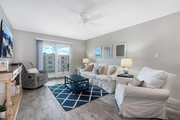 a bed room with a bed and a television