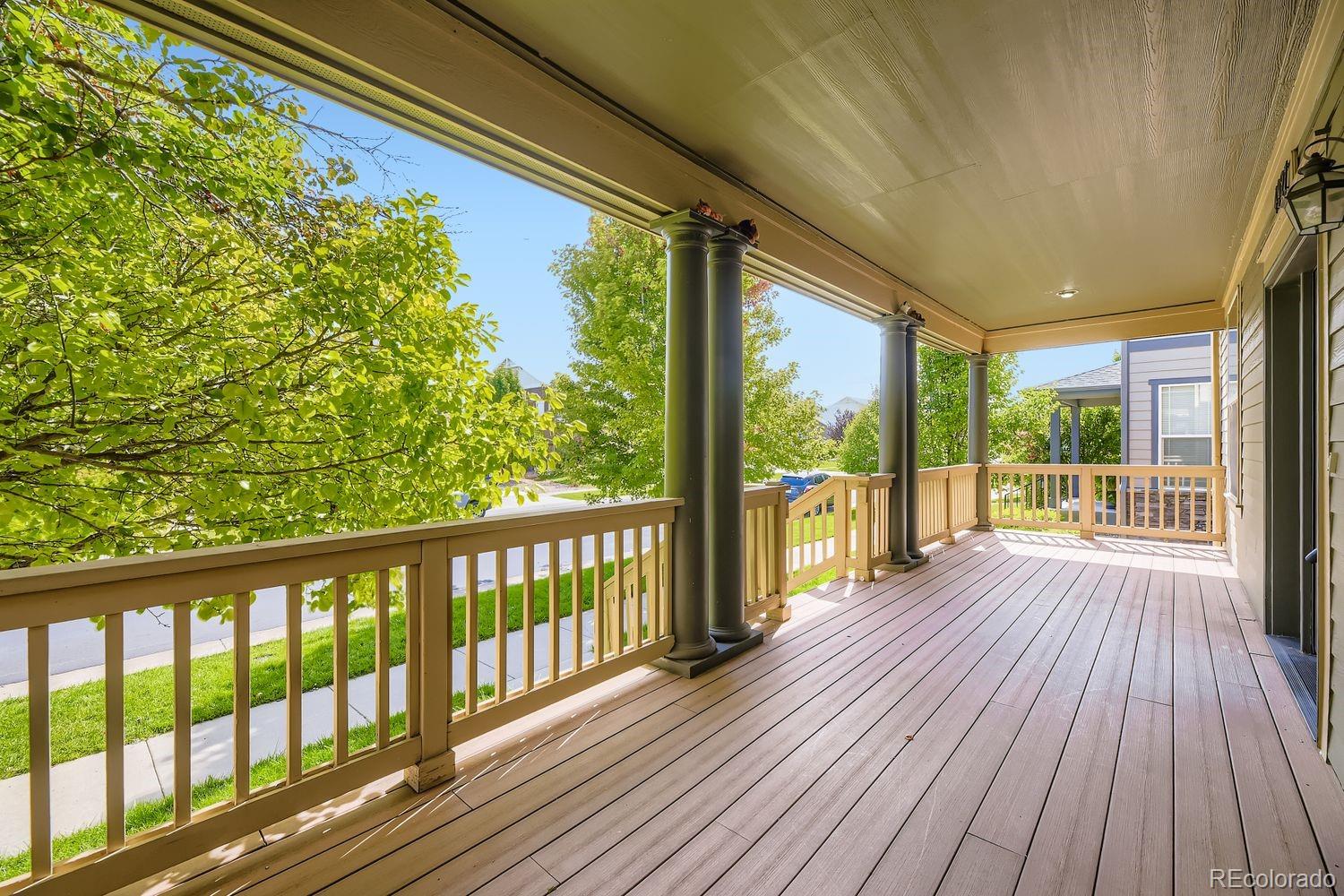 4927 South Addison Way Aurora, CO 80016 - Photo 4 of 24 a view of a wooden deck