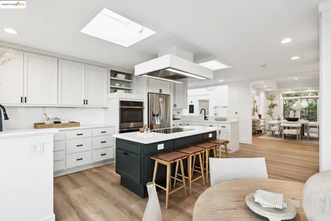 a spacious bedroom with a bed and window