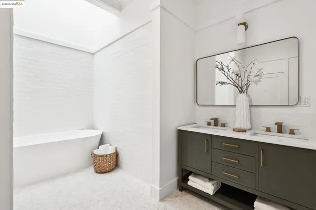 a bedroom with a bed and a table