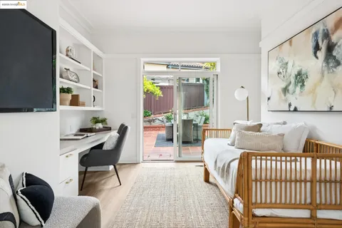 a bathroom with a toilet a sink and a mirror