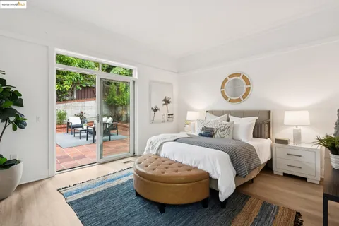 a living room with furniture or couch and a wooden floor