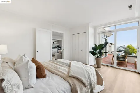 a view of a patio with table and chairs