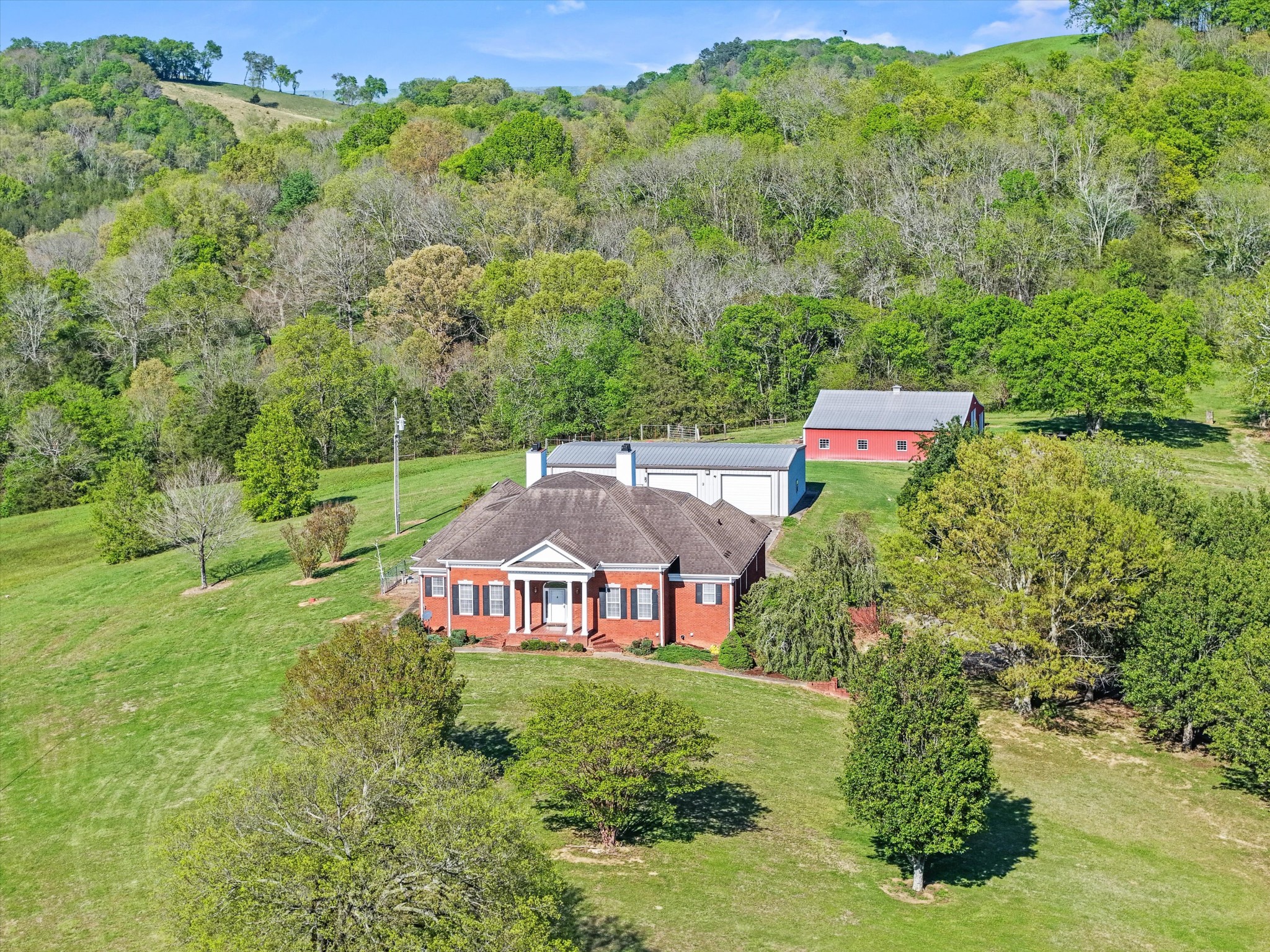 a view of a house with a big yard