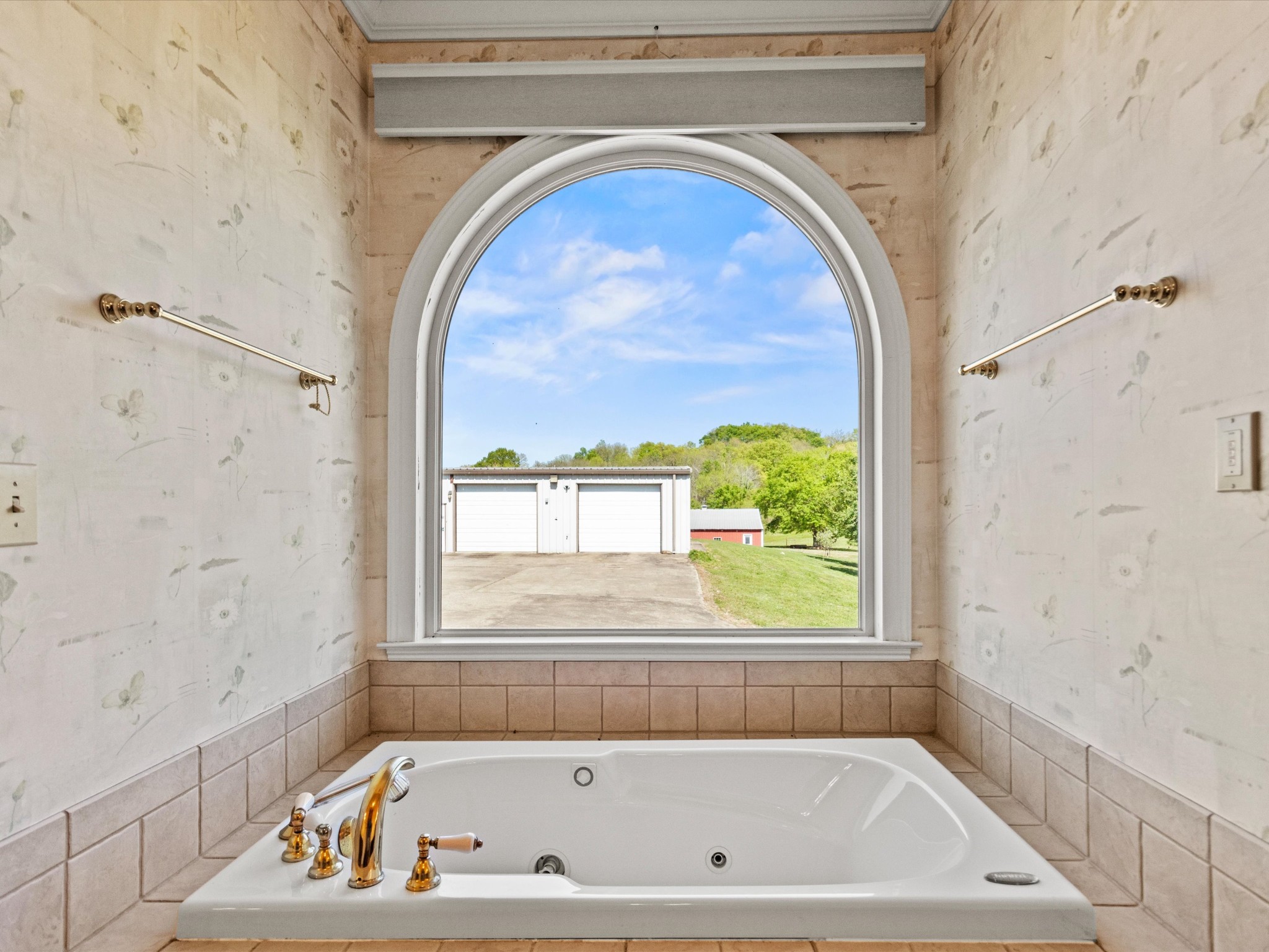 954 Molino Road Taft, TN 38488 - Photo 26 of 64 a bathroom with a tub and window