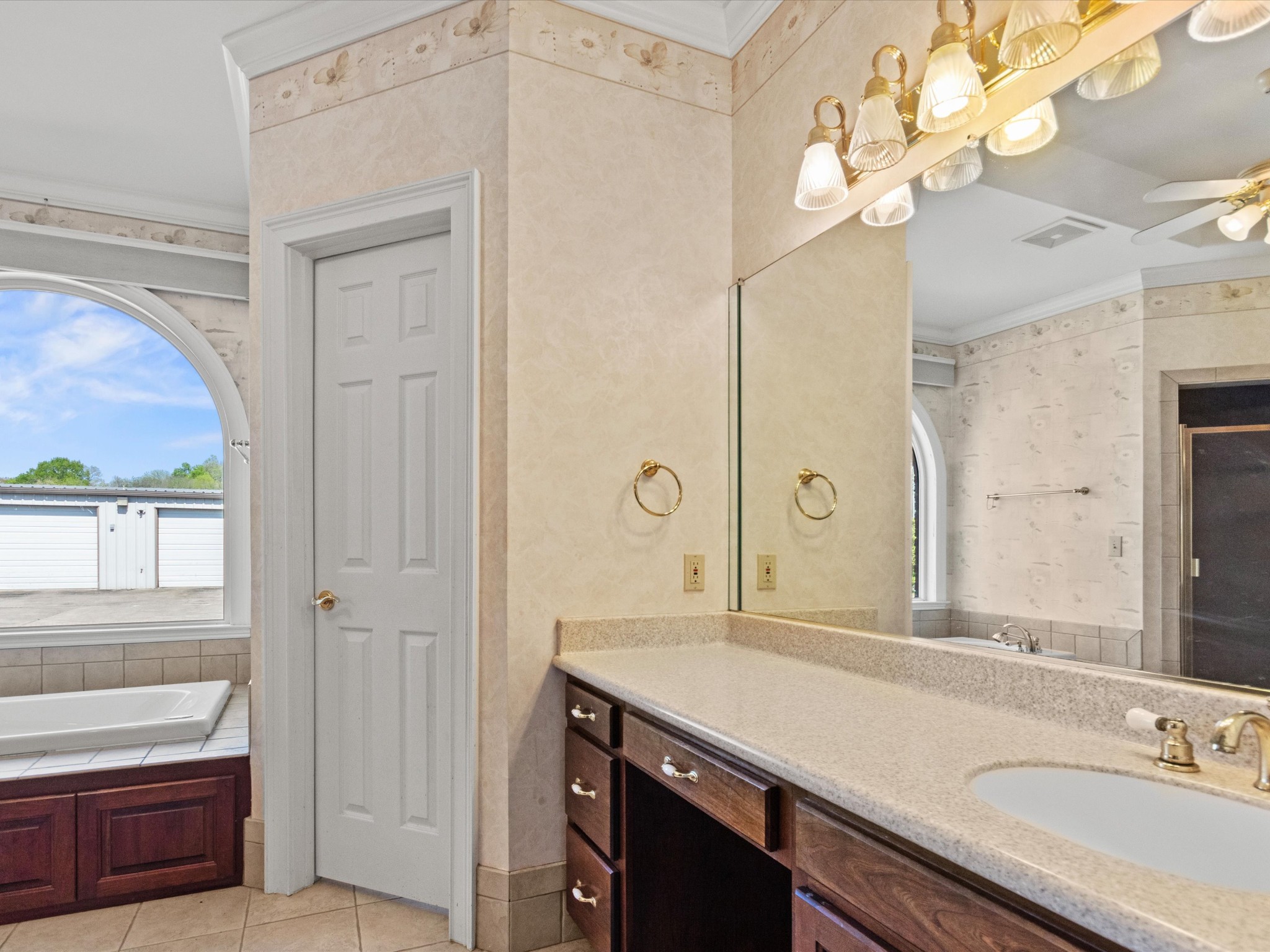 954 Molino Road Taft, TN 38488 - Photo 27 of 64 a bathroom with a sink a vanity and a mirror
