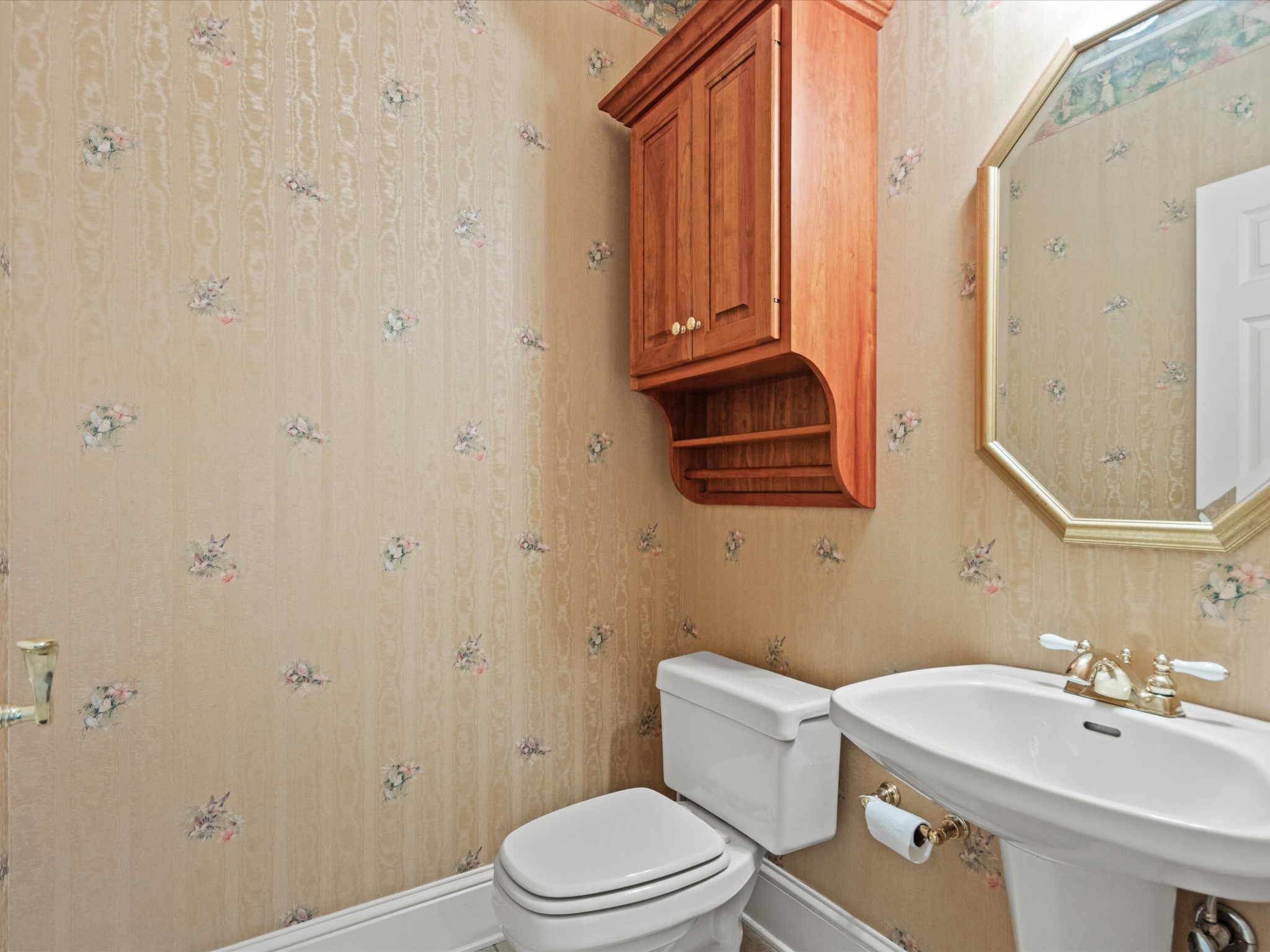 954 Molino Road Taft, TN 38488 - Photo 34 of 64 a bathroom with a sink a toilet and a mirror
