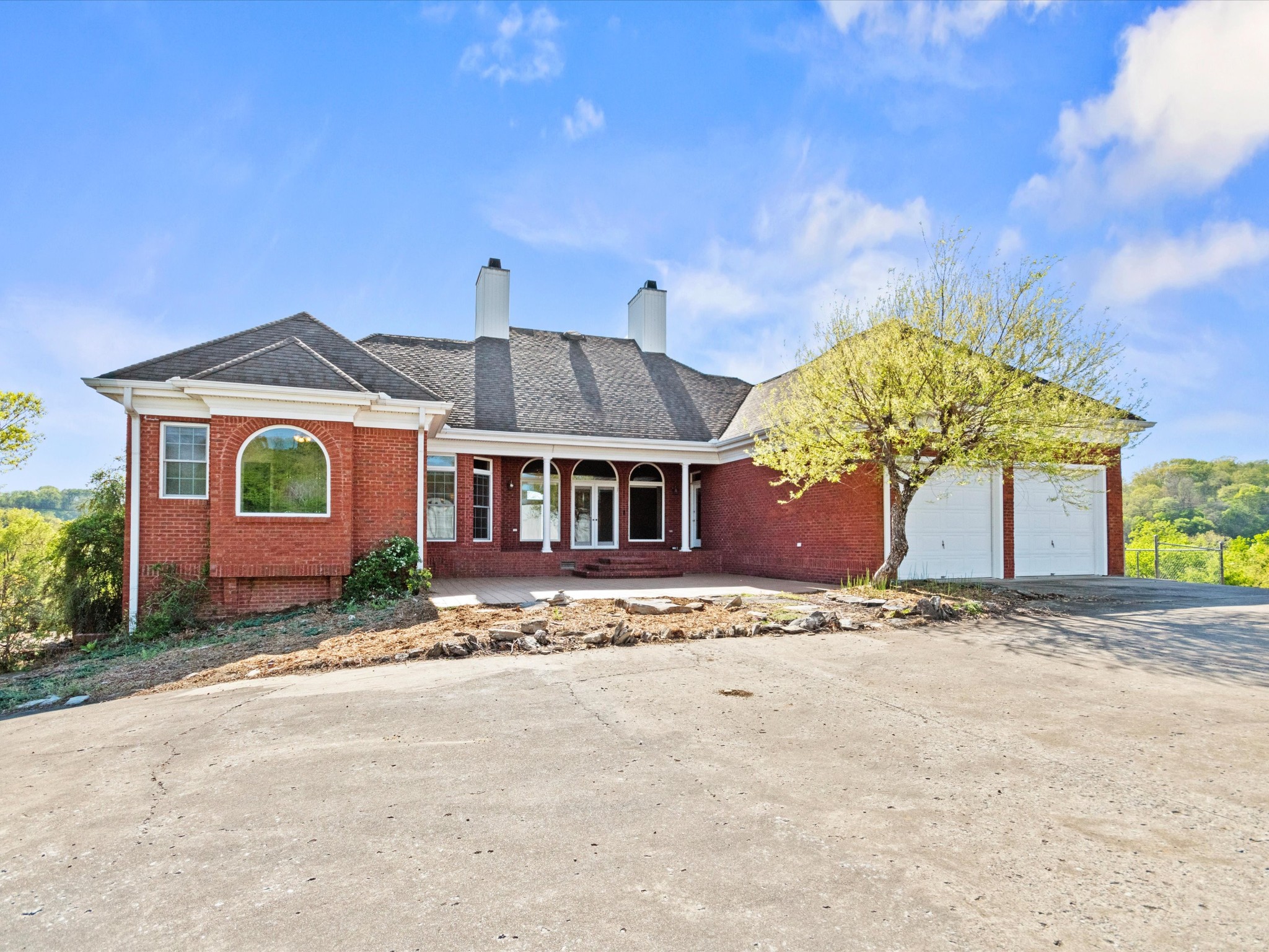 954 Molino Road Taft, TN 38488 - Photo 48 of 64 a front view of a house with a yard