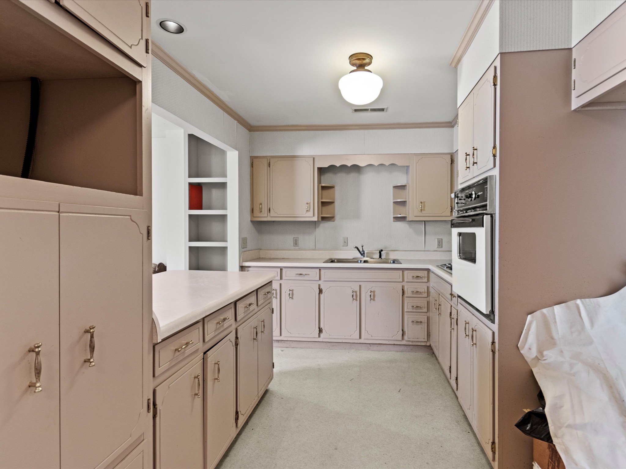 954 Molino Road Taft, TN 38488 - Photo 54 of 64 a kitchen with granite countertop cabinets and window