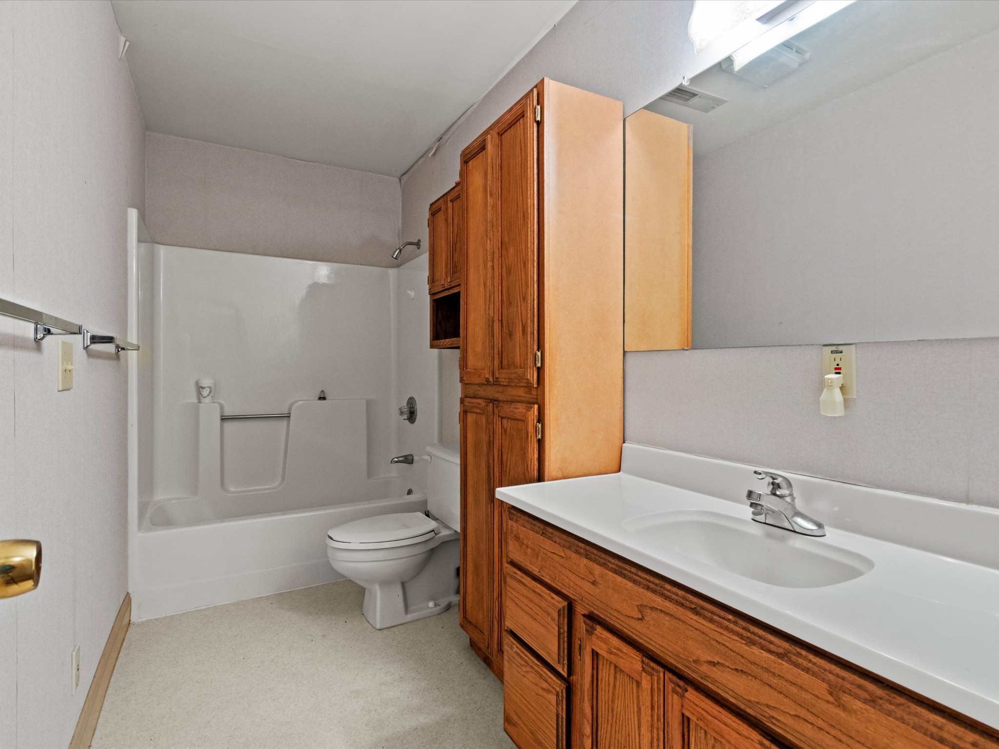 954 Molino Road Taft, TN 38488 - Photo 57 of 64 a bathroom with a granite countertop sink toilet and shower