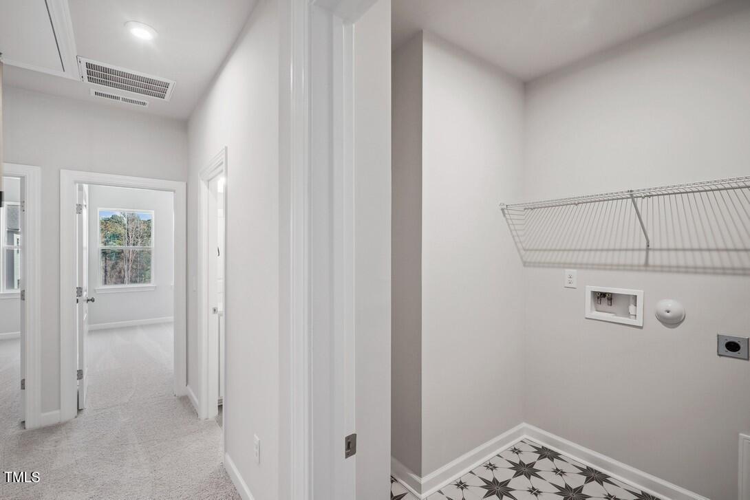 4705 Cypress Tree Lane Raleigh, NC 27612 - Photo 11 of 14 Laundry