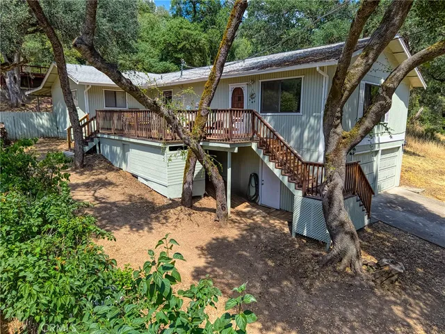 a house with trees in front of it
