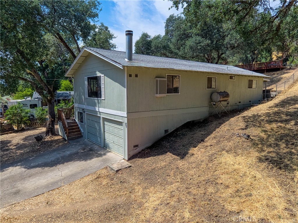 2976 Rancho Vista Drive Lucerne, CA 95458 - Photo 11 of 51 a view of a house with a backyard