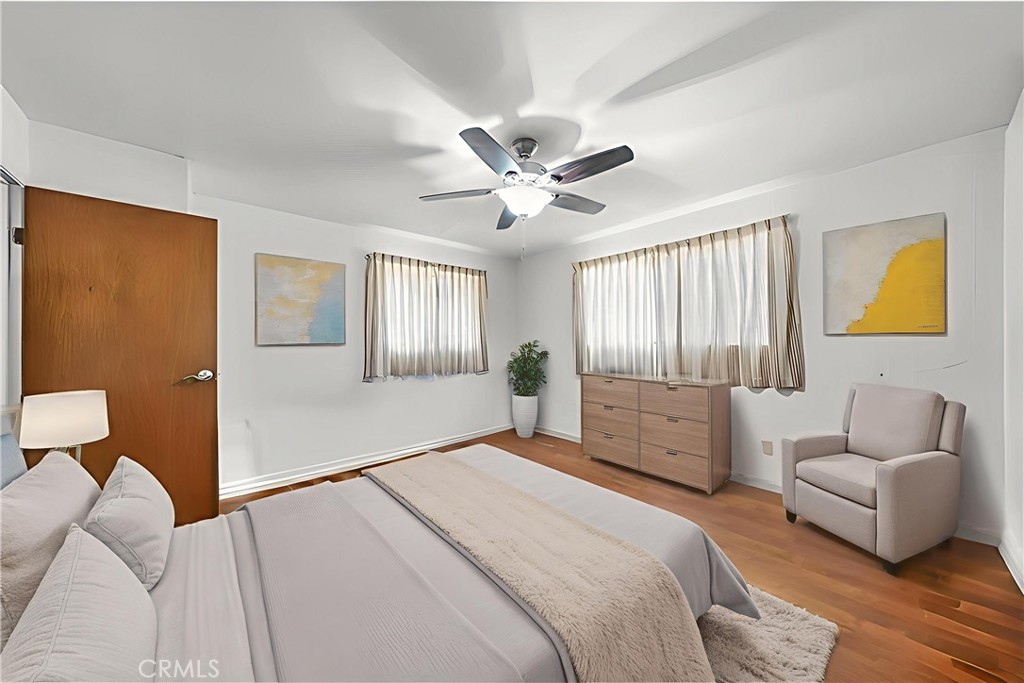 2976 Rancho Vista Drive Lucerne, CA 95458 - Photo 15 of 51 a bedroom with a bed couch and window