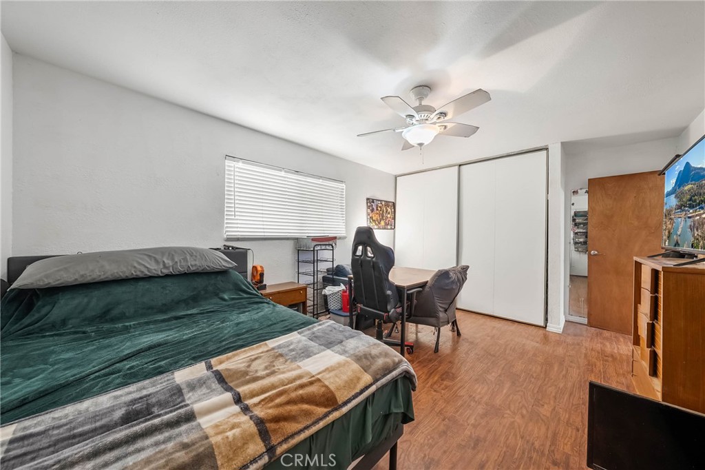 2976 Rancho Vista Drive Lucerne, CA 95458 - Photo 17 of 51 a bedroom with a bed and a table in it