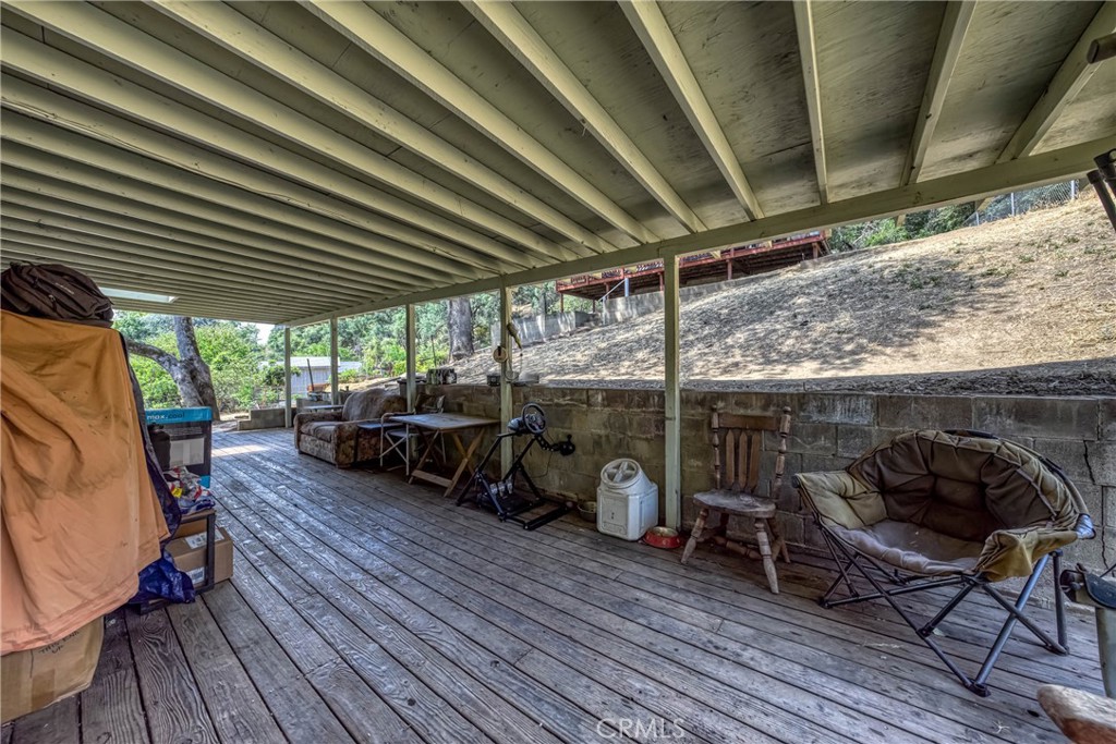 2976 Rancho Vista Drive Lucerne, CA 95458 - Photo 21 of 51 a view of a chairs and table in a patio