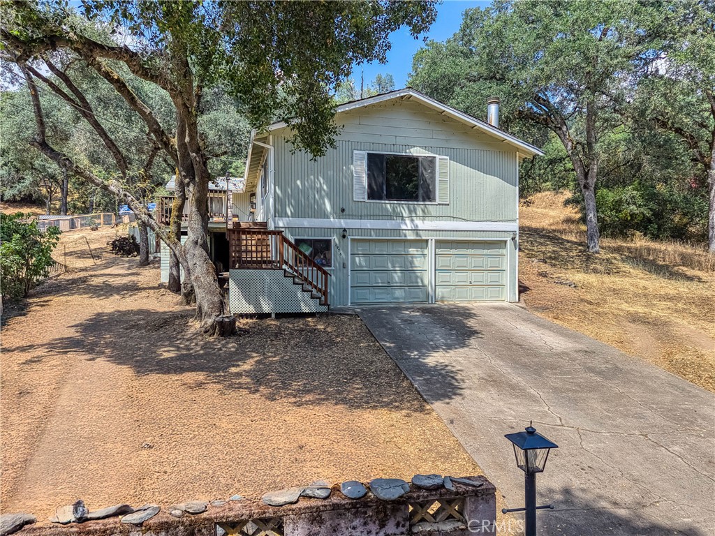 2976 Rancho Vista Drive Lucerne, CA 95458 - Photo 27 of 51 a front view of a house with a yard