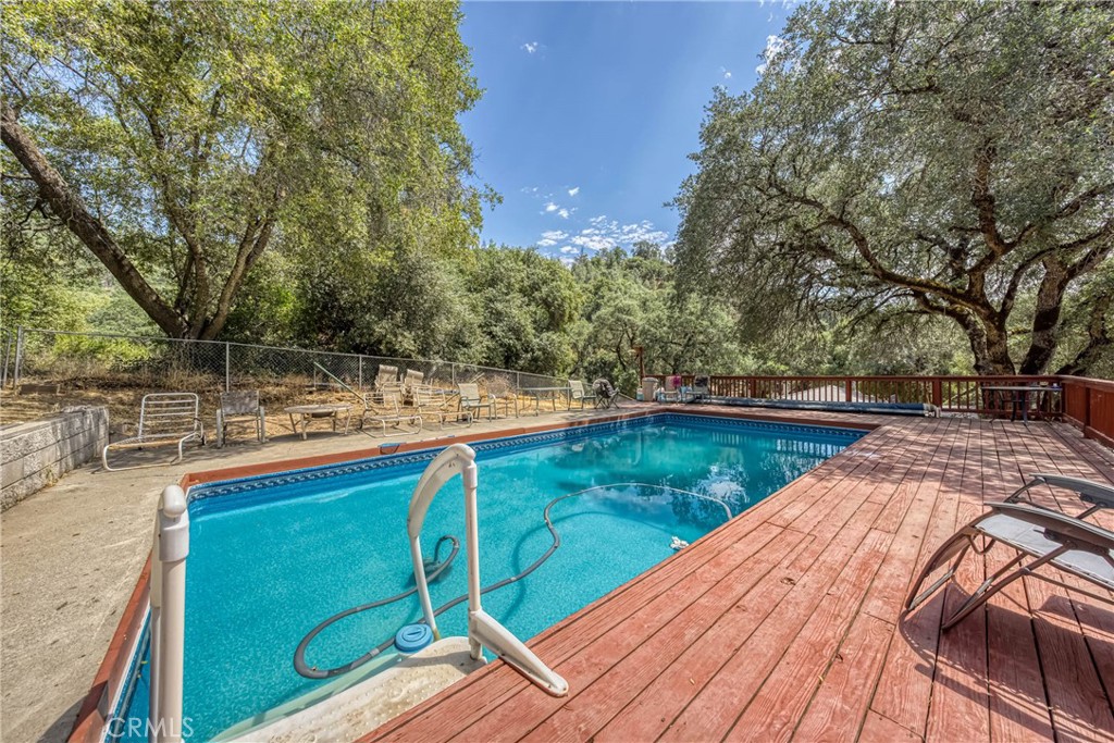 2976 Rancho Vista Drive Lucerne, CA 95458 - Photo 34 of 51 a view of swimming pool with a backyard
