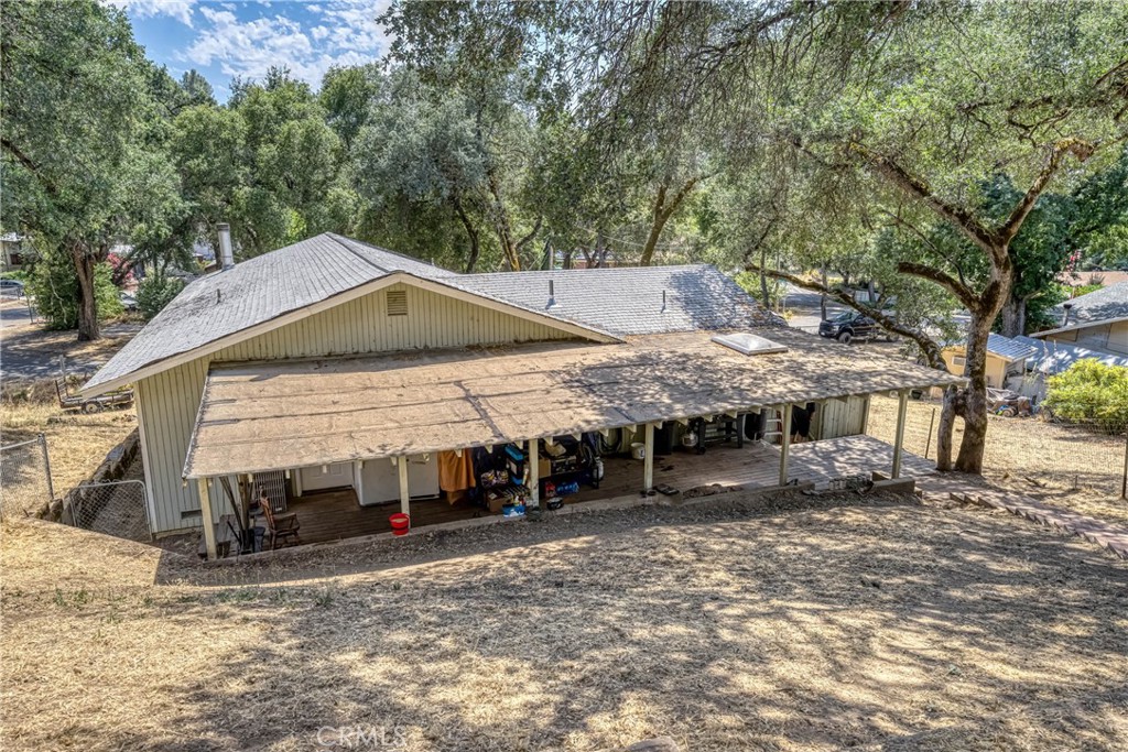 2976 Rancho Vista Drive Lucerne, CA 95458 - Photo 36 of 51 a view of a house with a yard and roof
