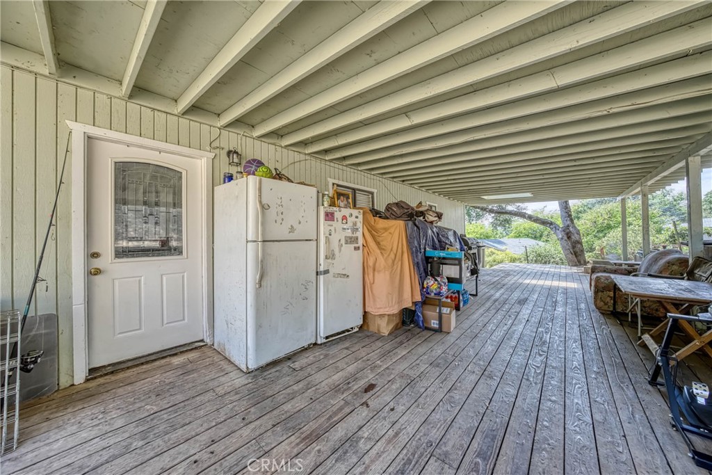 2976 Rancho Vista Drive Lucerne, CA 95458 - Photo 40 of 51 a view of a backyard with wooden floor and outdoor seating