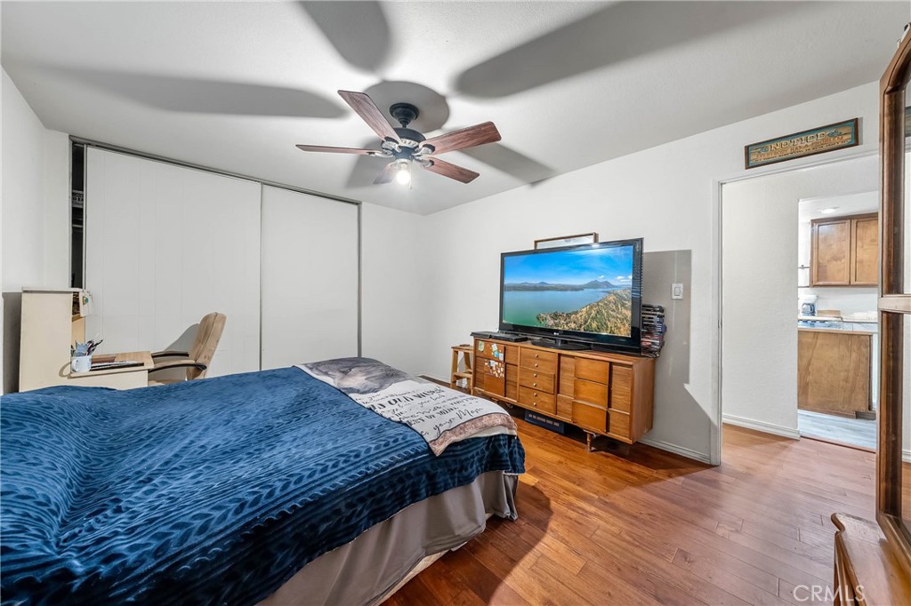 2976 Rancho Vista Drive Lucerne, CA 95458 - Photo 46 of 51 a bedroom with a bed and a flat screen tv