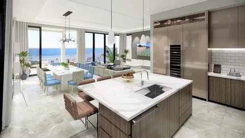 a living room with granite countertop furniture and a large window