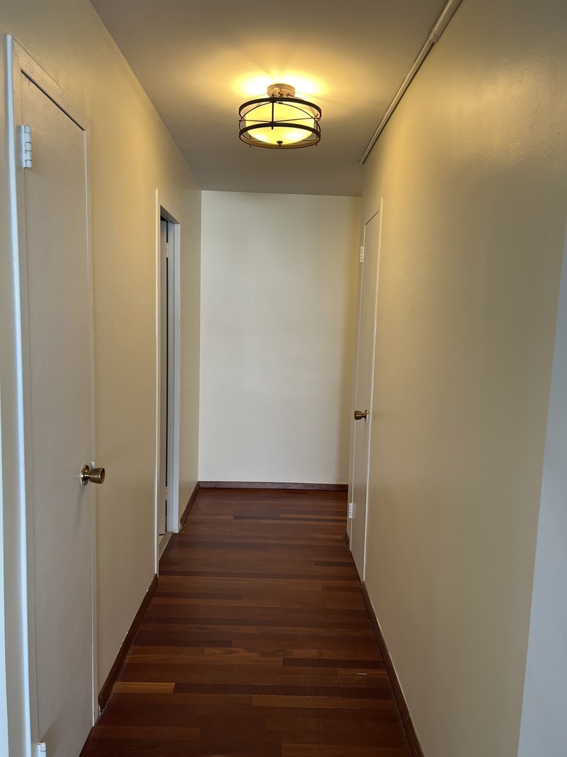 6301 North Sheridan Road, Unit 6L Chicago, IL 60660 - Photo 12 of 21 a view of an entryway with wooden floor
