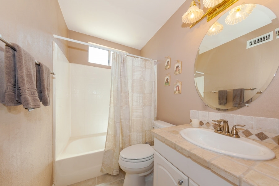 9276 High Rise Way Santee, CA 92071 - Photo 13 of 24 Hall bathroom with new counters and full tub/shower!