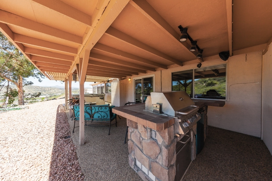 9276 High Rise Way Santee, CA 92071 - Photo 15 of 24 Right outside the Living room you can enjoy your covered patio with BBQ island!