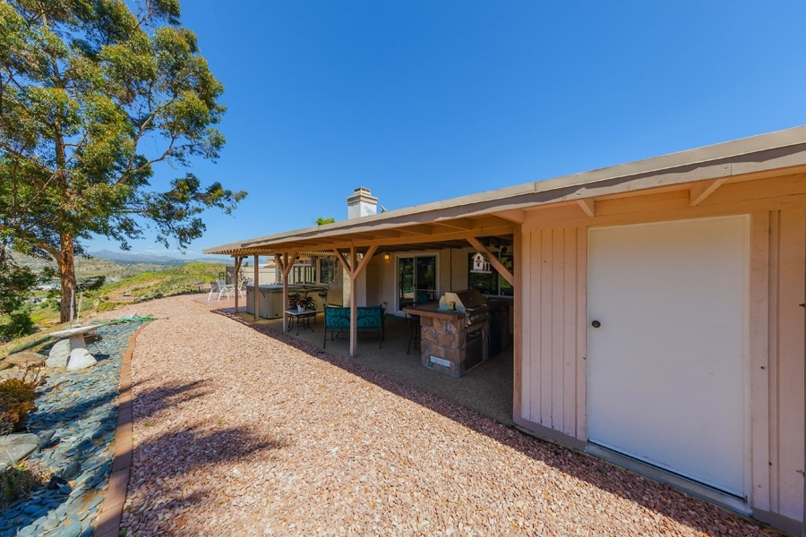 9276 High Rise Way Santee, CA 92071 - Photo 18 of 24 Built-in shed for extra storage is accessible from the back and the side of the house for storage convenience!