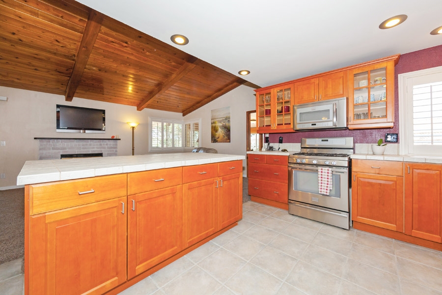 9276 High Rise Way Santee, CA 92071 - Photo 3 of 24 Custom cabinets with plenty of storage in the kitchen