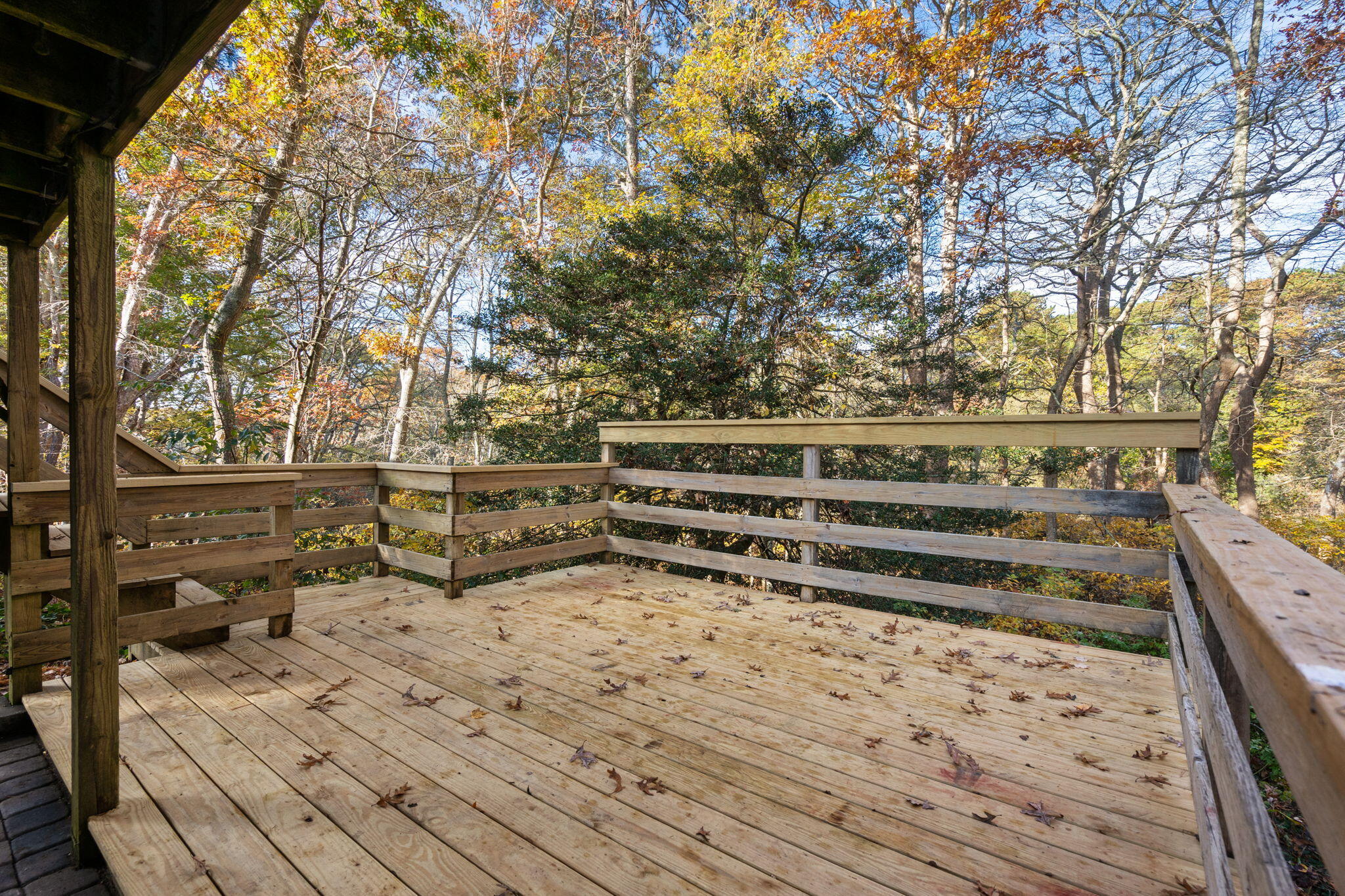 118 Fox Hill Road Centerville, MA 02632 - Photo 19 of 22 a view of a yard with wooden fence and trees