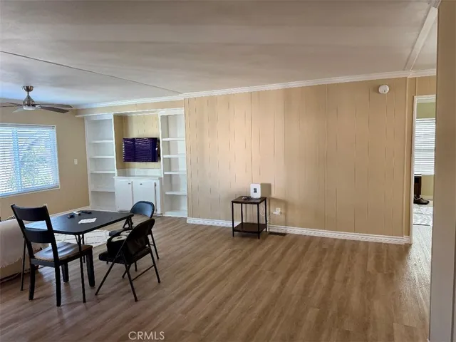 a view of a livingroom with furniture