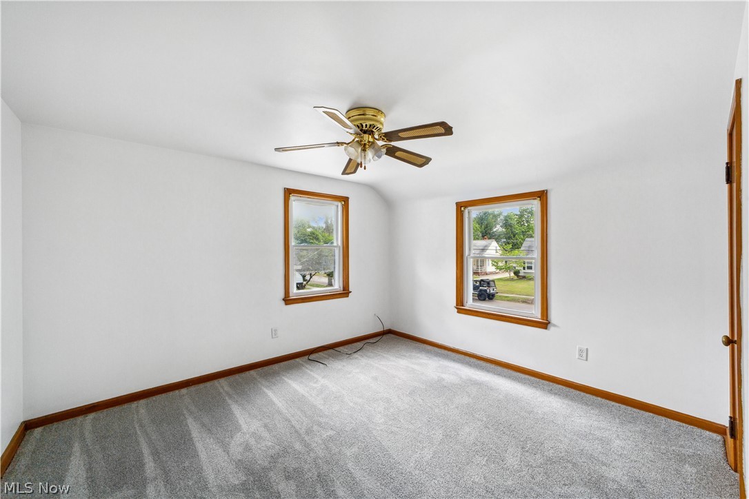 1655 Lyndhurst Road Cleveland, OH 44124 - Photo 17 of 30 Carpeted spare room with ceiling fan