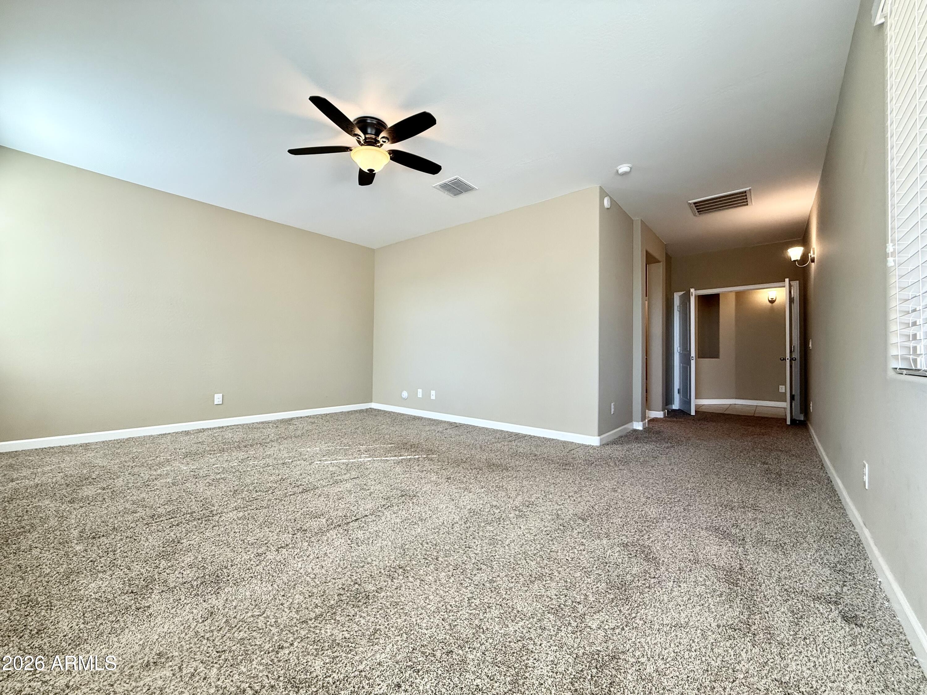 40865 West Hensley Way Maricopa, AZ 85138 - Photo 15 of 22 Primary Bedroom