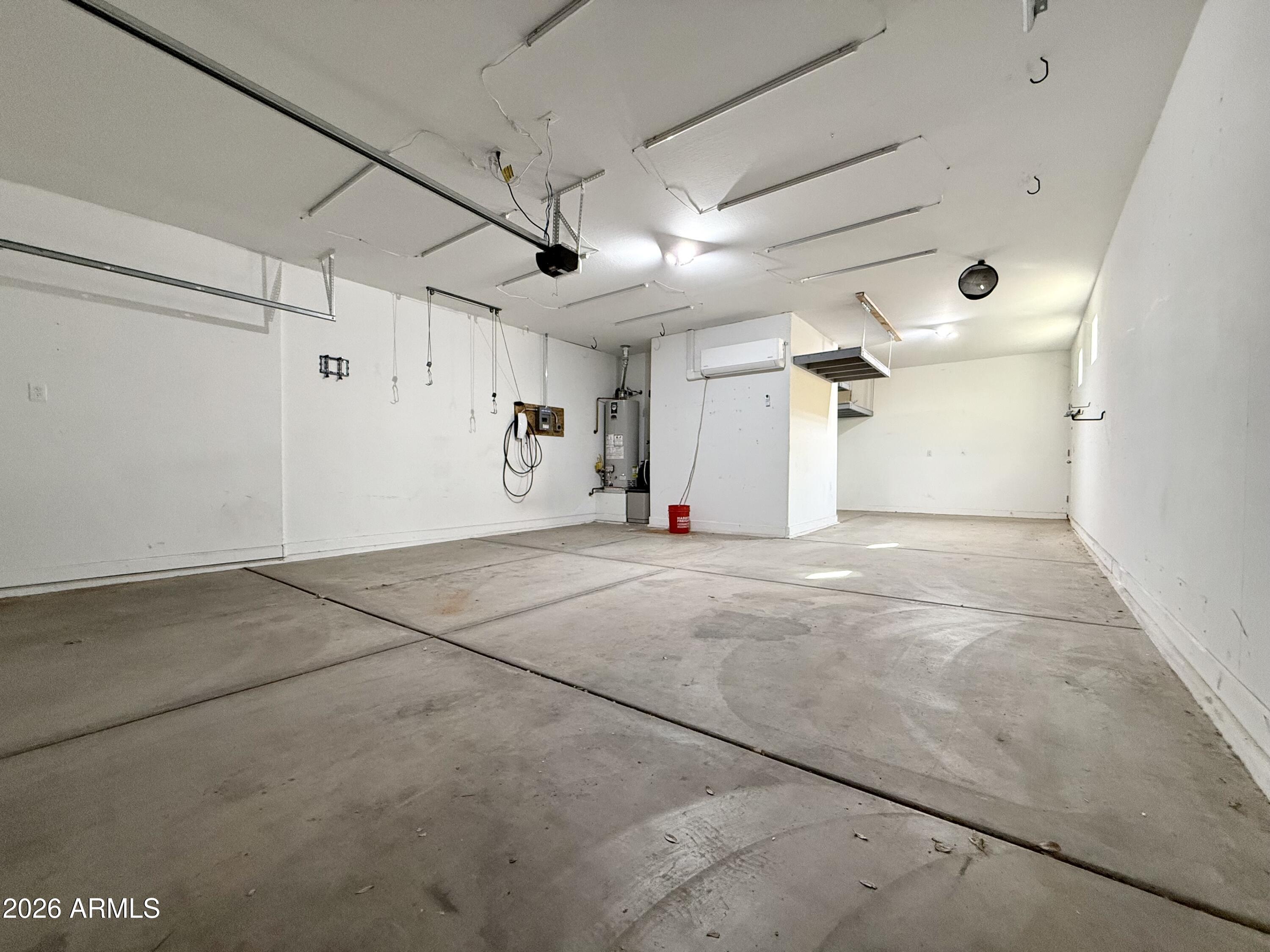 40865 West Hensley Way Maricopa, AZ 85138 - Photo 19 of 22 Three Car Garage with Mini Split