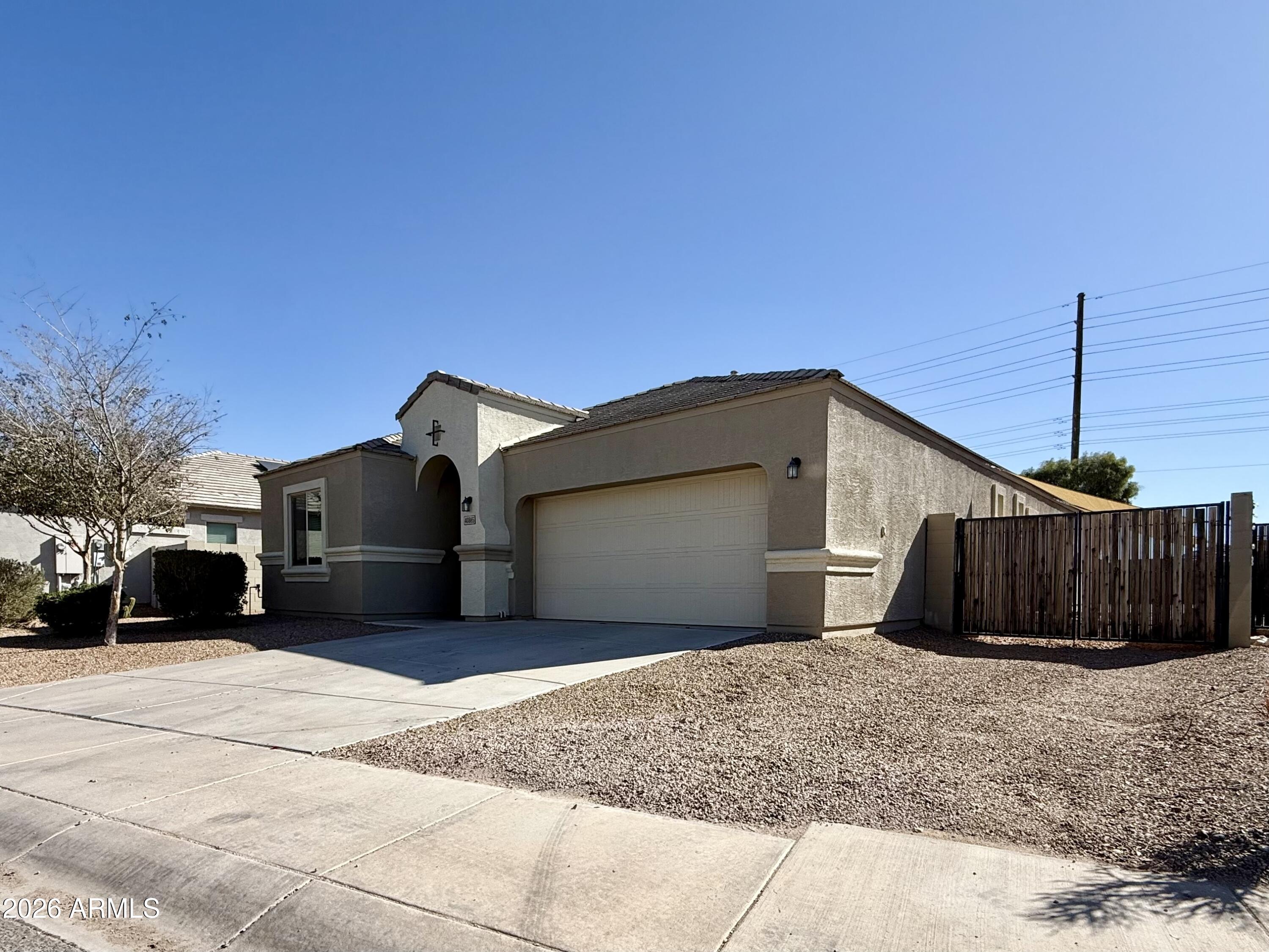 40865 West Hensley Way Maricopa, AZ 85138 - Photo 2 of 22 Front of Home