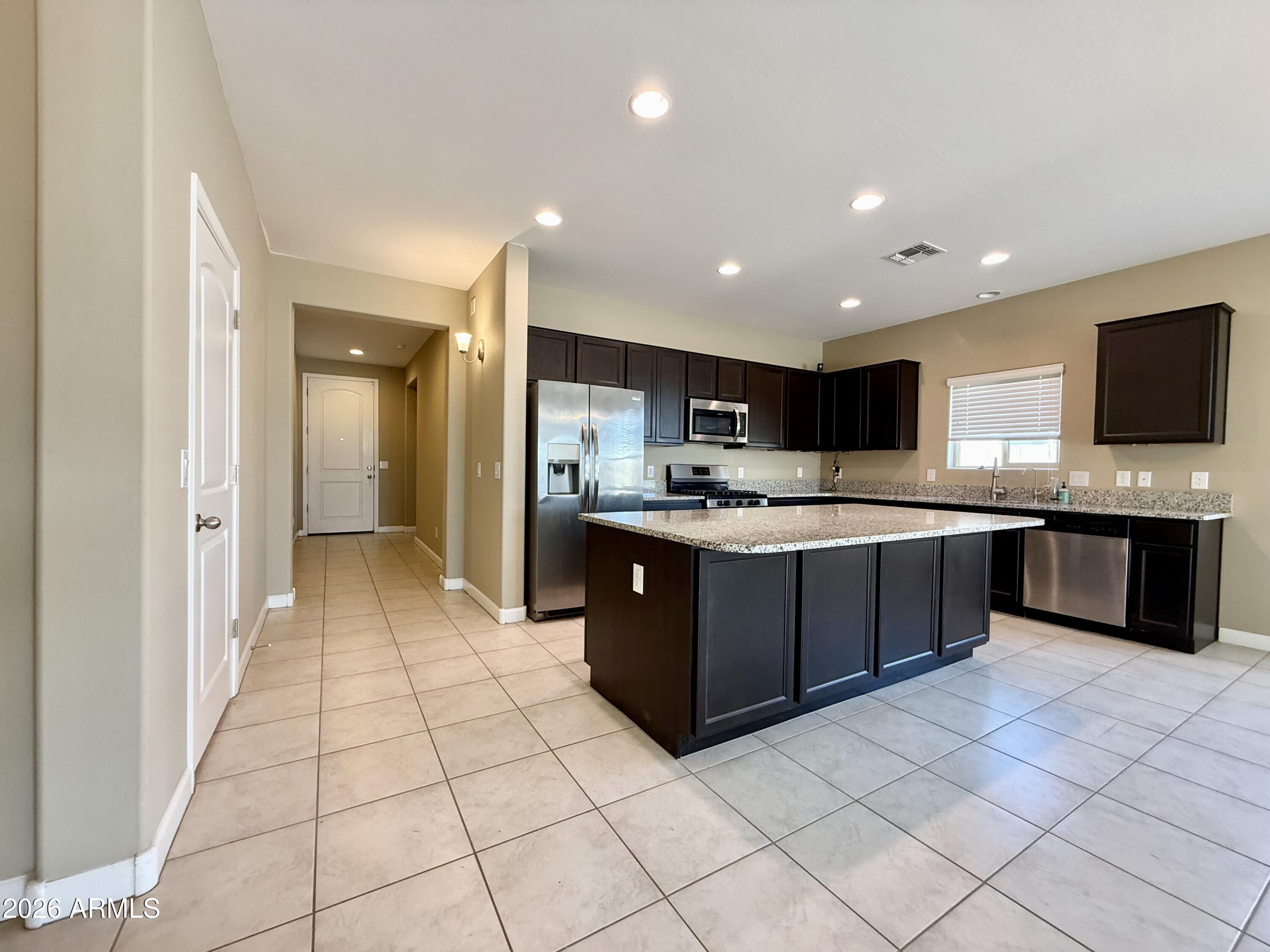 40865 West Hensley Way Maricopa, AZ 85138 - Photo 8 of 22 Kitchen with Gas Stove