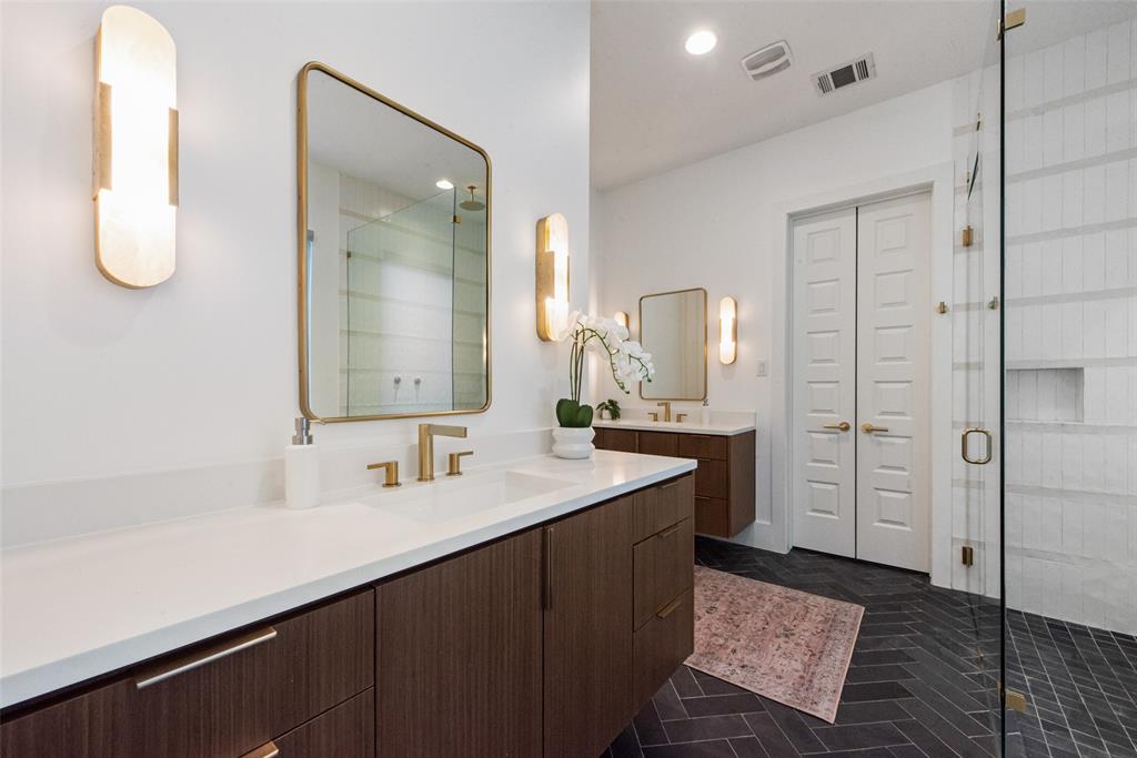 6443 Kenwood Avenue Dallas, TX 75214 - Photo 16 of 21 Bathroom with a shower stall and two vanities
