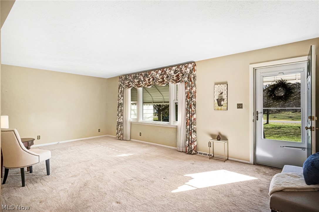 6452 Carsten Road Medina, OH 44256 - Photo 2 of 41 Sitting room featuring light colored carpet